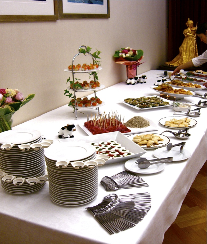 A long buffet table laden with prawns, seafood platters and salads at a 148@Azabujyuban catering event